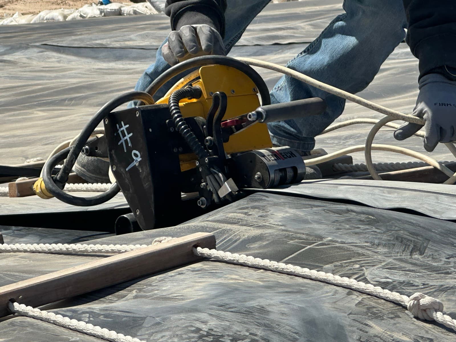 Seam welding and quality assurance testing on HDPE liner